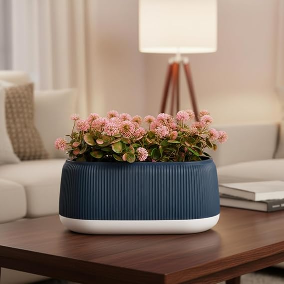 pink flowers with blue and white plastic pot | realistic 20 cm greenery | durable plastic | stylish & compact | zero maintenance | indoor, outdoor, home & office decor pink flowers with blue and white plastic pot | realistic 20 cm greenery | durable plastic | stylish & compact | zero maintenance | indoor, outdoor, home & office decor